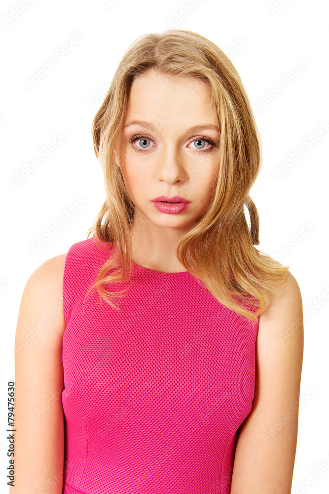 Young blonde woman wearing pink skirt Young blonde woman wearing pink skirt