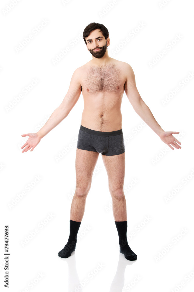 Young shirtless man with arms wide open. Young shirtless man with arms wide open.
