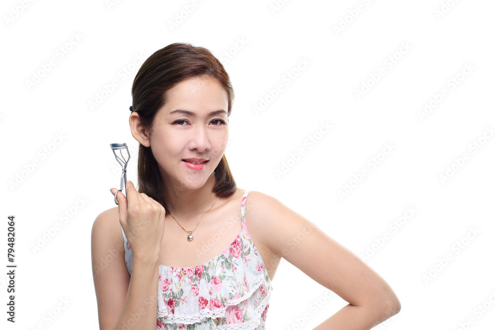 women asian happy smiling with eyelash curler isolated women asian happy smiling with eyelash curler isolated
