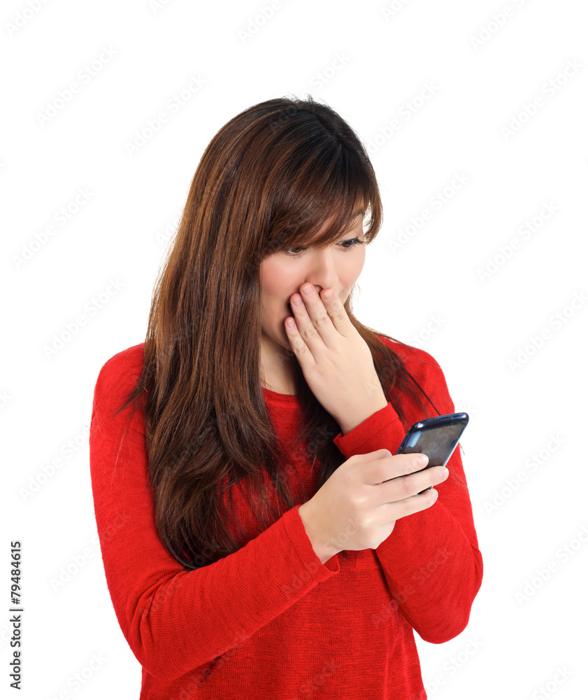 Naklejka premium Asian girl in disbelief with mobile phone