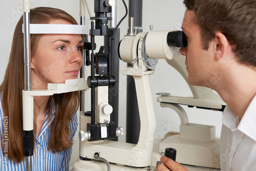 Woman Having Sight Test At Opticians