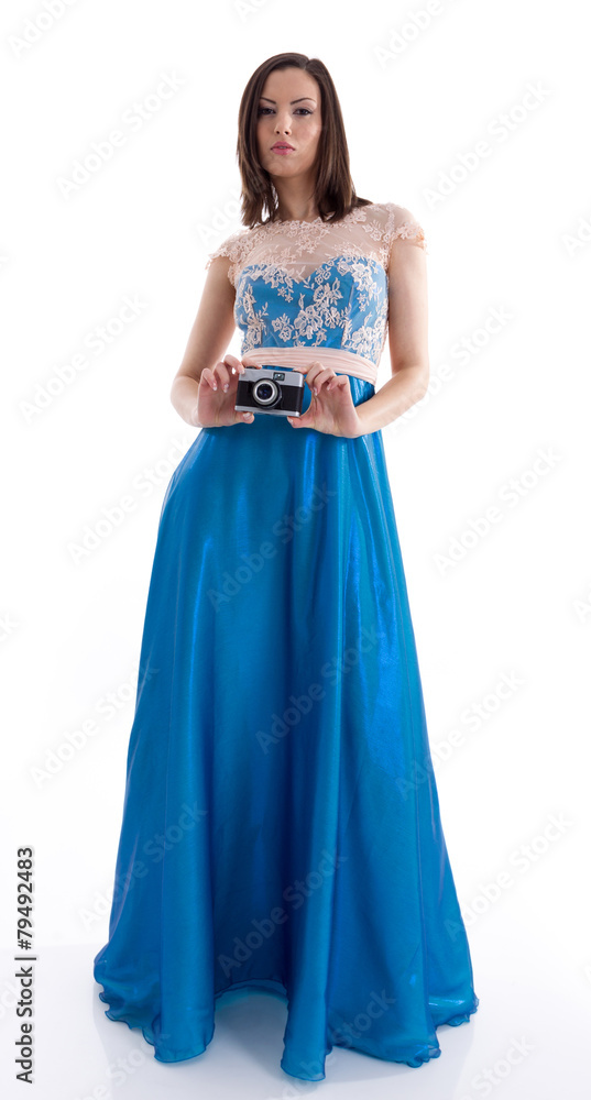 Beautiful woman in a blue dress shooting