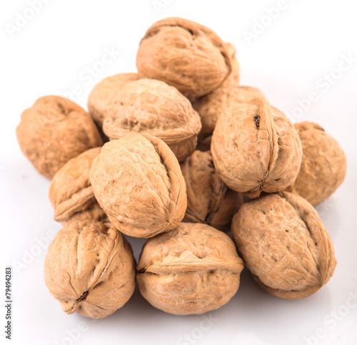 Walnut nuts over white background