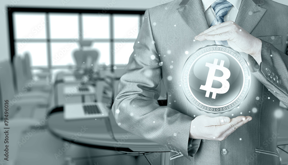 Businessman with protective gesture bitcoins