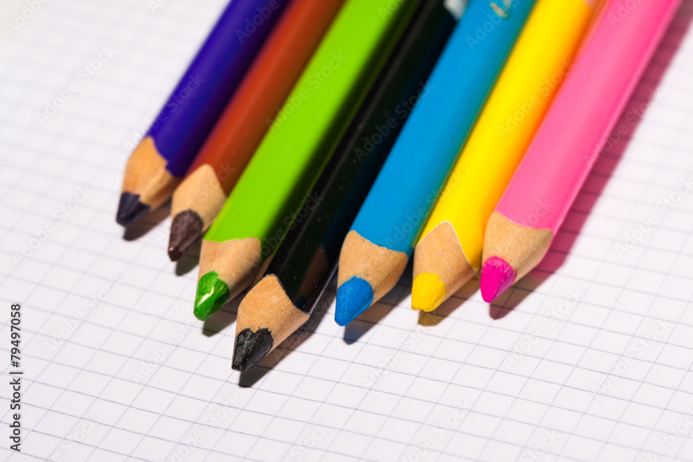 Colored pencils. Very shallow depth of field. Focus on blue penc Colored pencils. Very shallow depth of field. Focus on blue penc