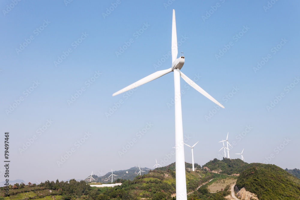 Fototapeta premium Wind Turbines with blue sky