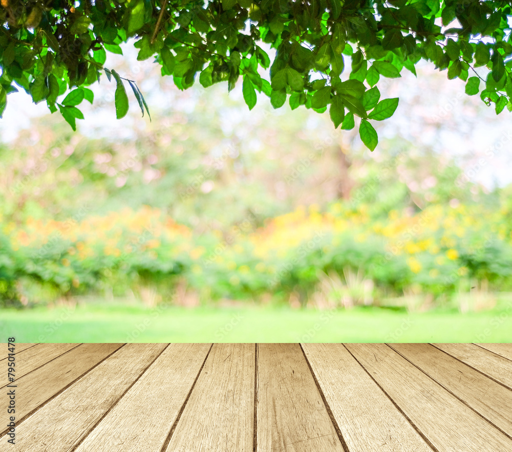 Perspective wood over blur trees with bokeh background Perspective wood over blur trees with bokeh background