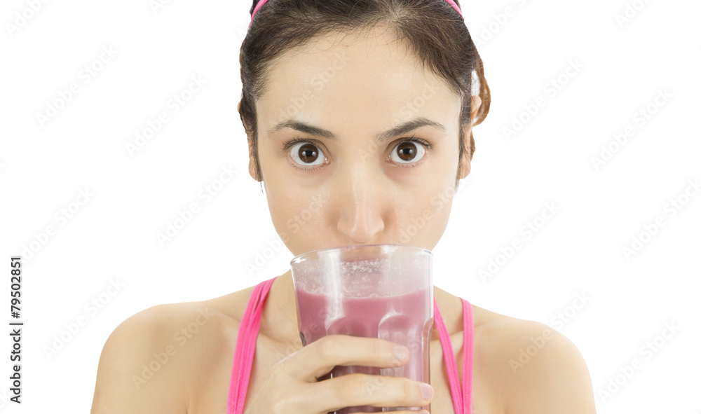 Woman drinking strawberry smoothie Woman drinking strawberry smoothie