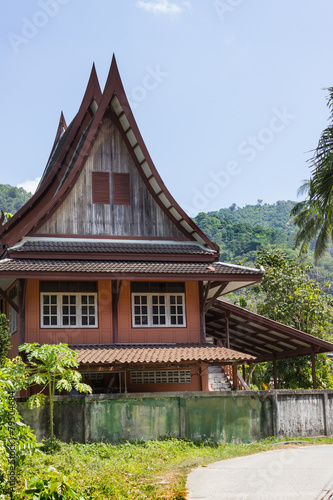 Little Thai houses and palm trees © sever180