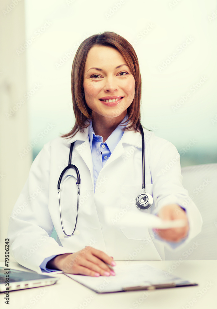 smiling doctor with laptop computer and clipboard smiling doctor with laptop computer and clipboard