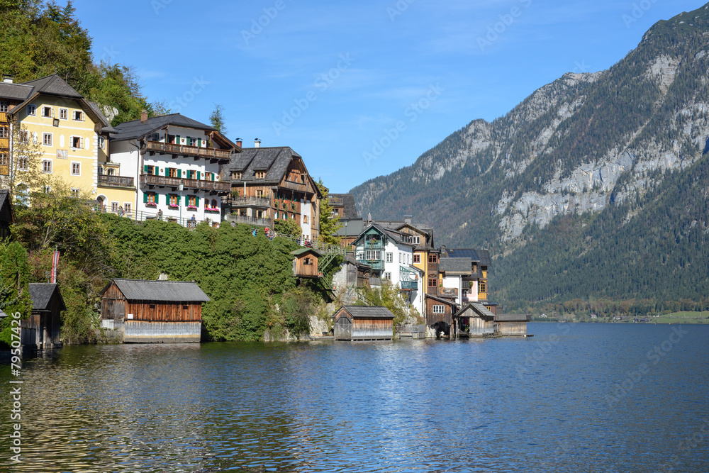 View of famous old town Hallstatt village in Alps at sunny day, Salzkammergut, Austria