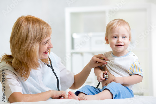 doctor and kid boy with ste...