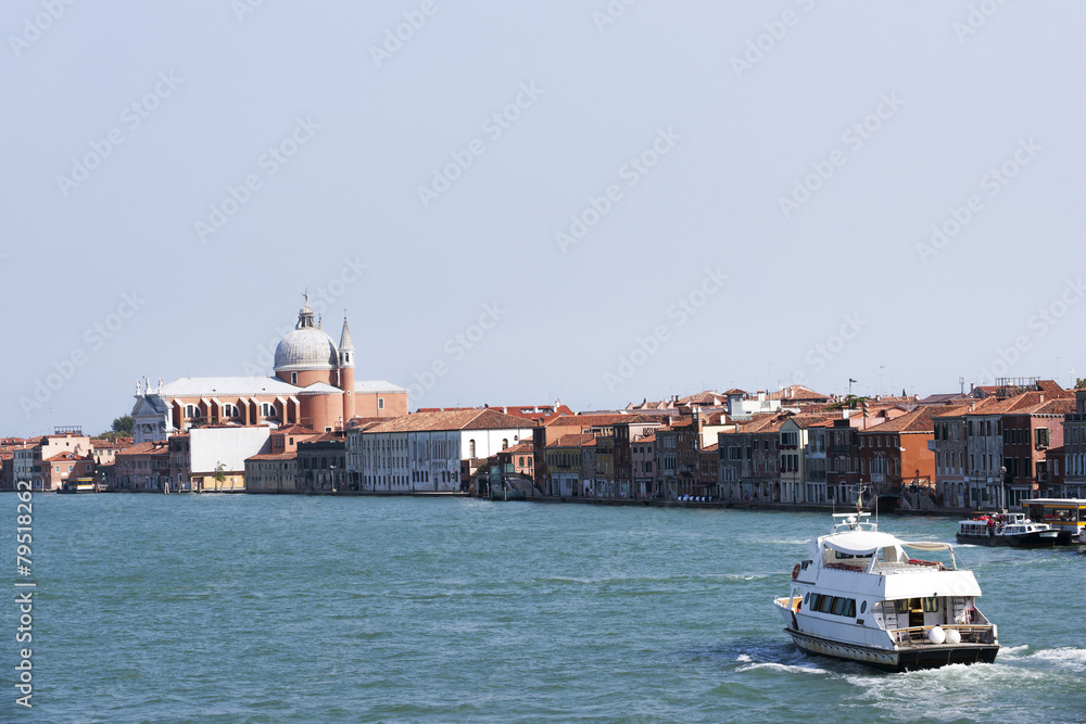 Civil passenger boat at the channel in summer Venice Civil passenger boat at the channel in summer Venice