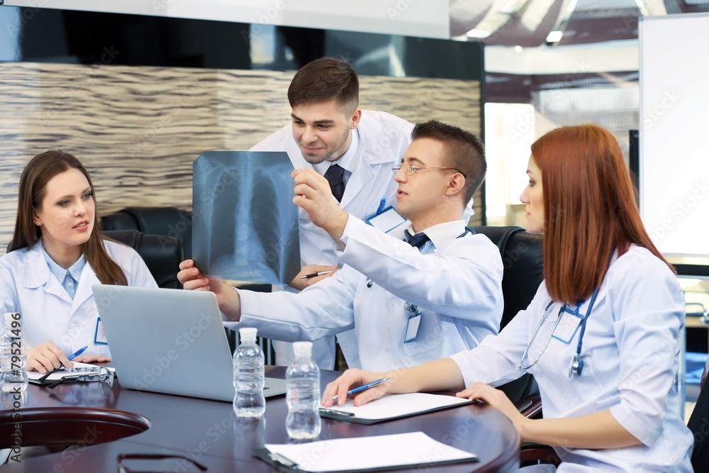 Fototapeta premium Medical workers working in conference room