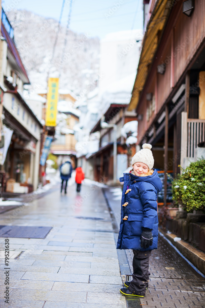Little girl at town in Japan