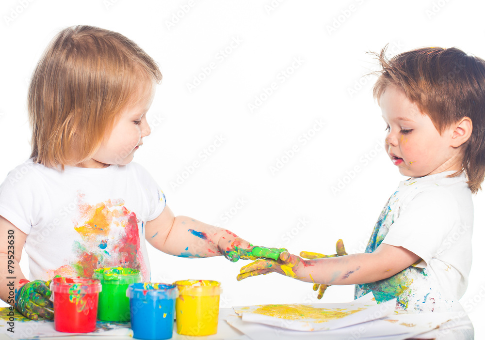 Children playing with finger paints Children playing with finger paints