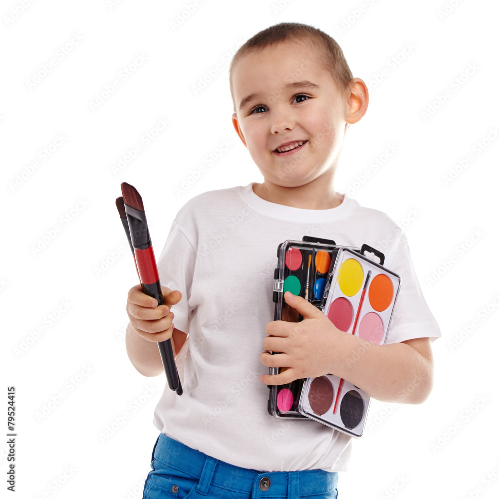 Portrait of a little boy enjoying his painting. Education. Isola Portrait of a little boy enjoying his painting. Education. Isola