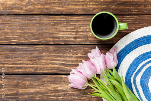 Fototapeta Naklejka Na Ścianę i Meble -  Hat and cup of coffee with tulips