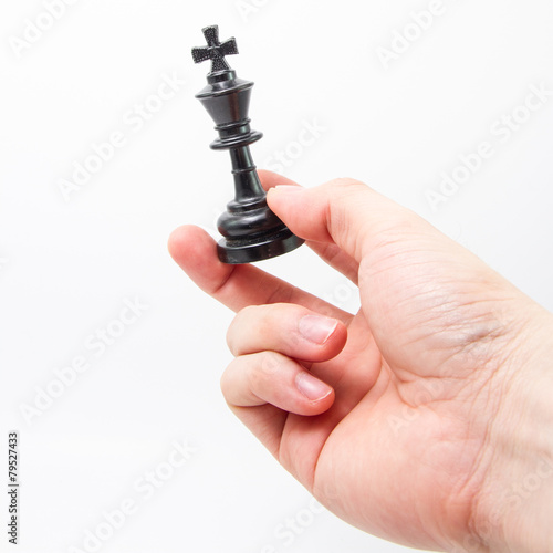hand holding chess king