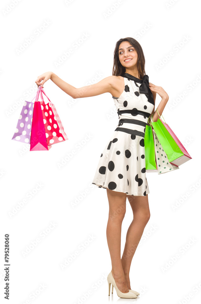 Woman with shopping bags isolated on white