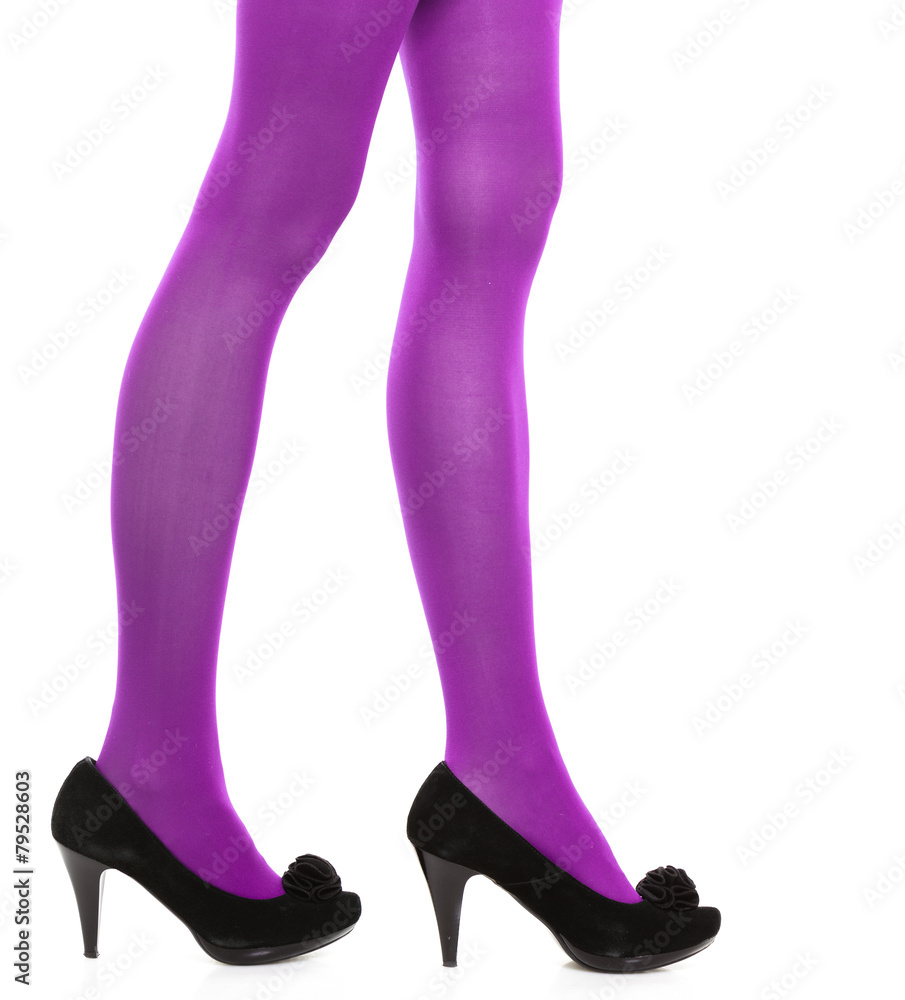 Woman long legs and violet stockings isolated Woman long legs and violet stockings isolated