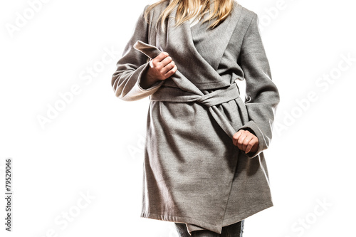 elegant woman in gray coat.