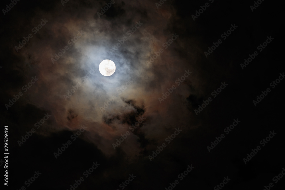 Blurred - dark stormy sky with moon Blurred - dark stormy sky with moon