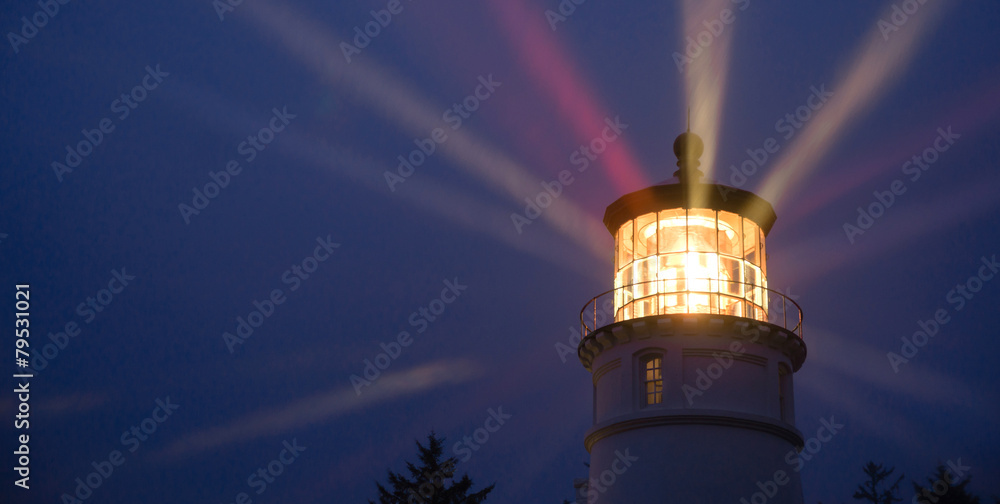Obraz premium Lighthouse Beams Illumination Into Rain Storm Maritime Nautical