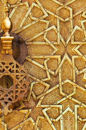 Photography Detail of a brass door and knocker in Fez, Morocco