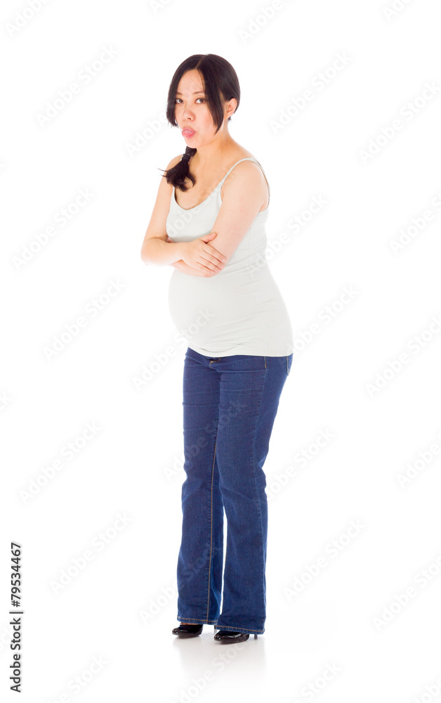 Pregnant asian woman isolated on white tongue out Pregnant asian woman isolated on white tongue out
