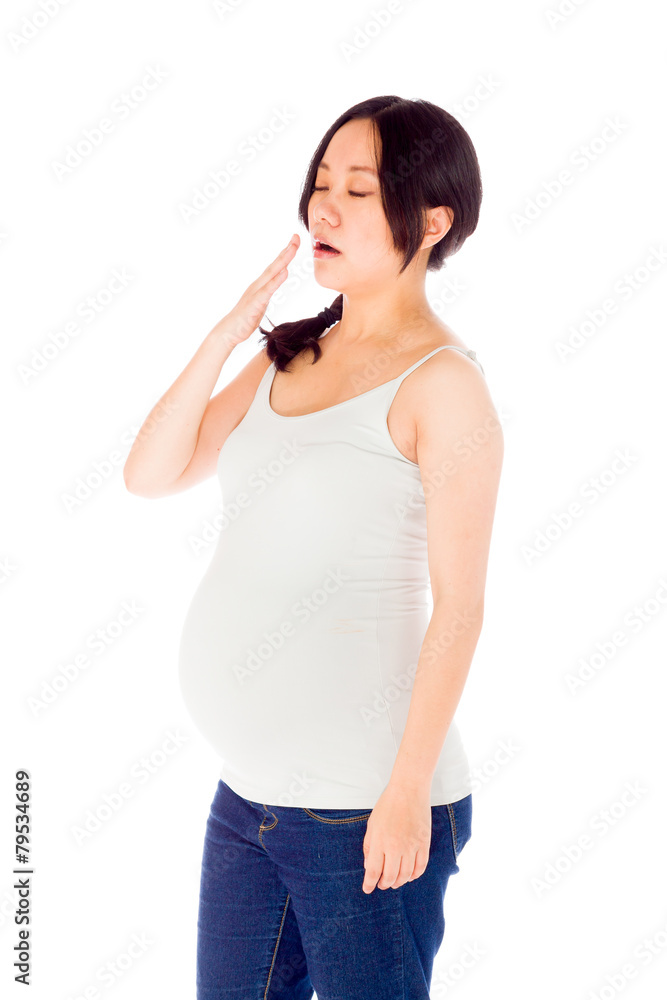 Pregnant asian woman isolated on white tired yawning Pregnant asian woman isolated on white tired yawning