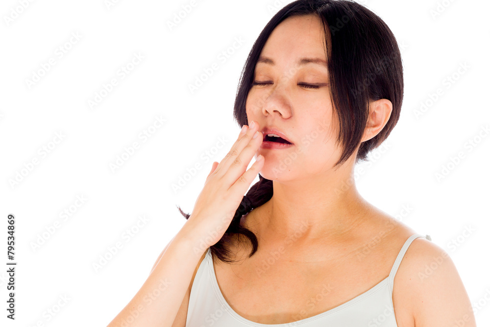 Pregnant asian woman isolated on white tired yawning Pregnant asian woman isolated on white tired yawning