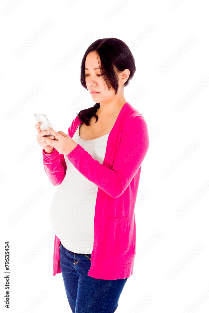 Pregnant asian woman isolated on white with cell phone Pregnant asian woman isolated on white with cell phone