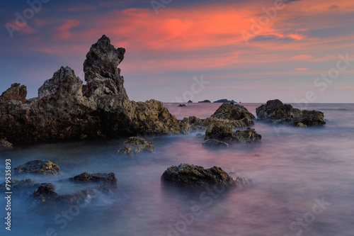 Beautiful sunset at the stone beach, Thailand