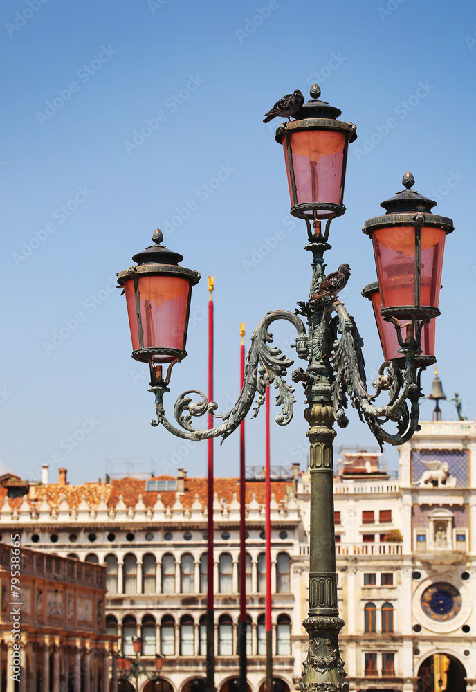Lantern over Clock Tower in Venice. Italy