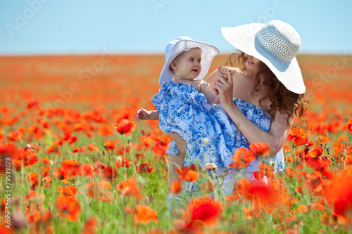 baby with his mother enjoying a field day outdoors  © nuzza11