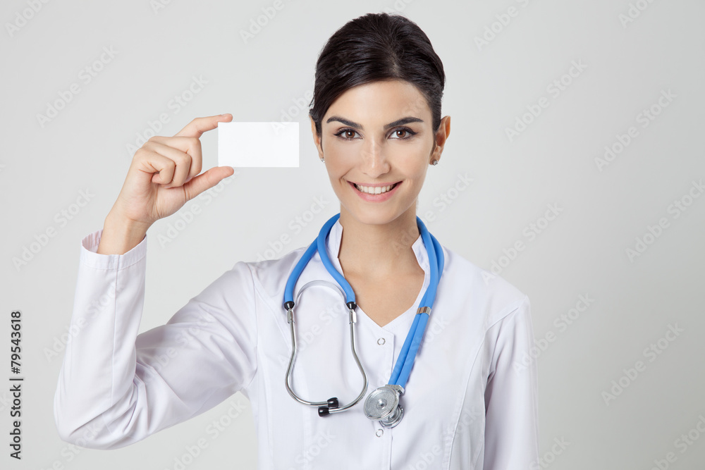 Smiling medical doctor woman with empty blank in hands. Smiling medical doctor woman with empty blank in hands.