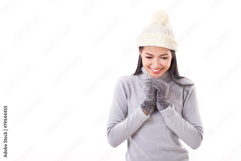 happy woman making a wish or praying in fall or winter