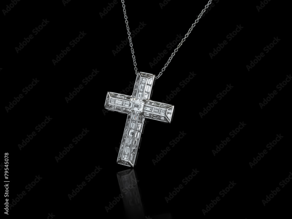 Diamonds Cross necklace on black background Diamonds Cross necklace on black background