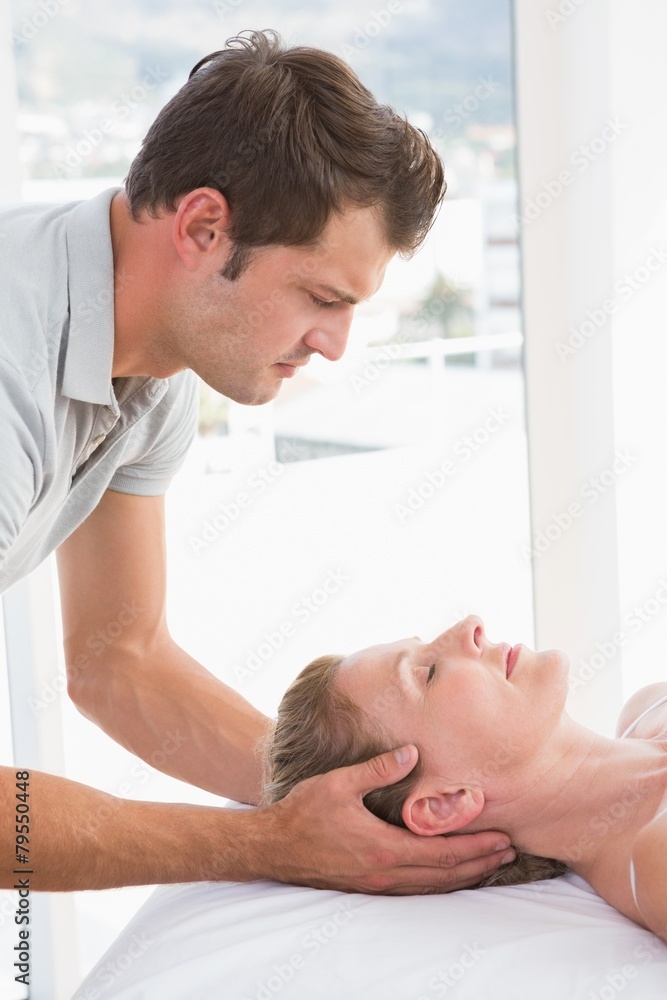 Fototapeta premium Woman receiving neck massage