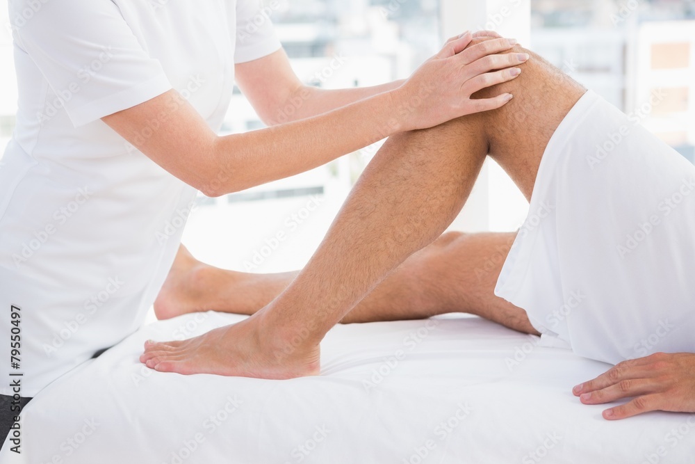 Fototapeta premium Man having leg massage