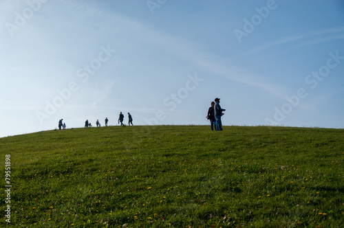 People over the hill