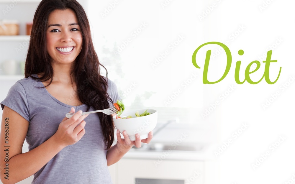 Diet against beautiful woman enjoying a bowl of salad Diet against beautiful woman enjoying a bowl of salad