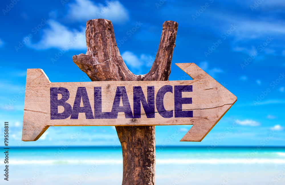 Balance wooden sign with beach background