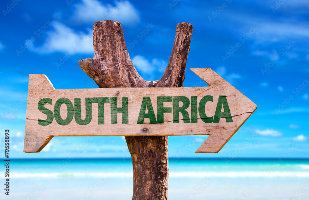South Africa wooden sign with beach background