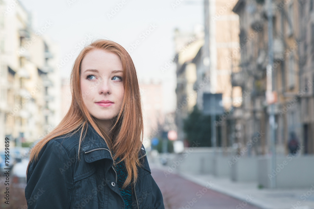 Beautiful girl posing in the city streets Beautiful girl posing in the city streets