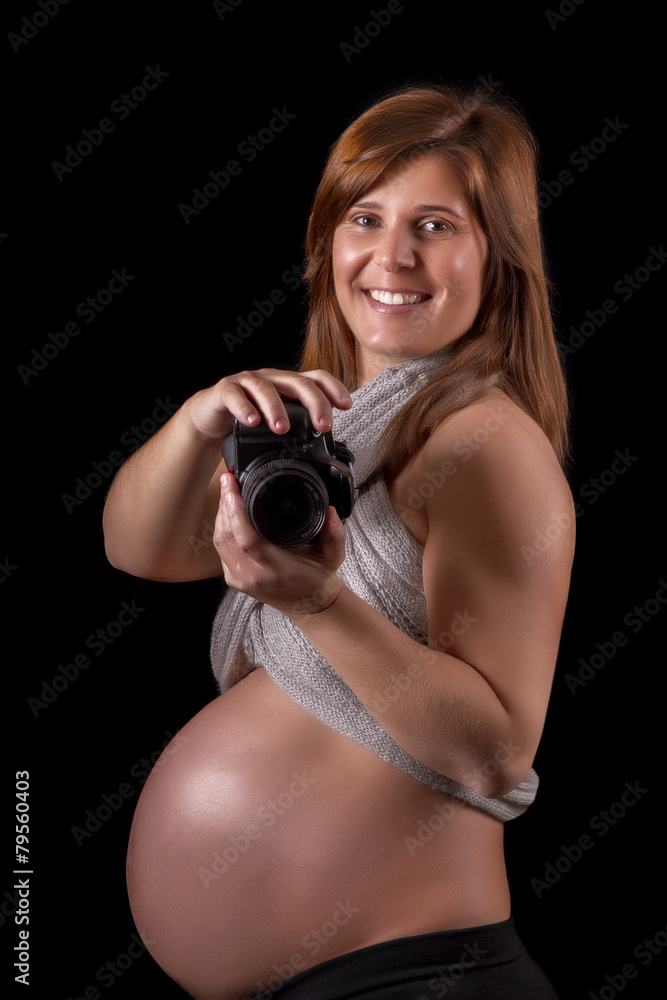 Fototapeta premium Close view of a expecting pregnant woman