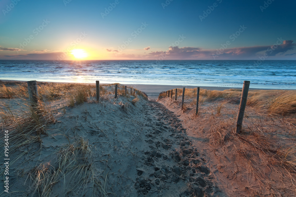path no North sea beach at sunset