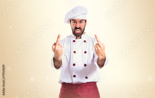 Wallpaper Mural Chef making horn gesture over white background Torontodigital.ca