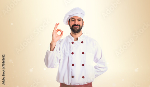Wallpaper Mural Chef making Ok sign over white background Torontodigital.ca
